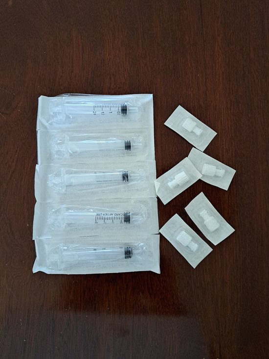 Colostrum / Moedermelk voedingspuitjes 2 cc met dop (5 stuks) spuitjes steriel moedermelkspuitjes van Merkloos