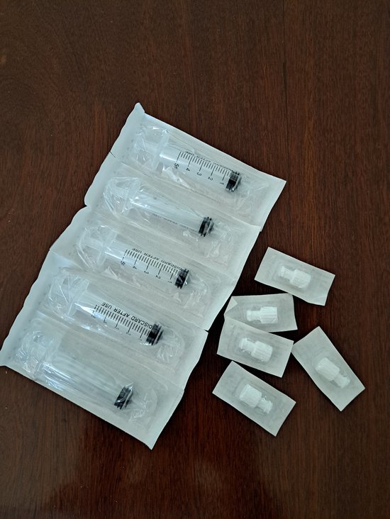 Colostrum / Moedermelk voedingsspuitjes 5cc met dop (5 stuks) spuitjes moedermelkspuitjes van Merkloos