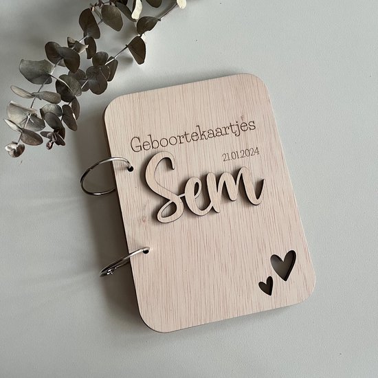 Geboortekaartjes bundel met naam (hartjes) van $