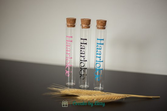 Haarlokje en melktandjes buisjes in mooi bewaarzakje Blauw van Beloved Baby.